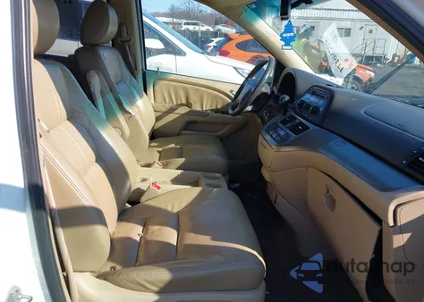 2010 Honda Odyssey Ex-L z USA, uszkodzony, nr VIN 5FNRL3H67AB097550